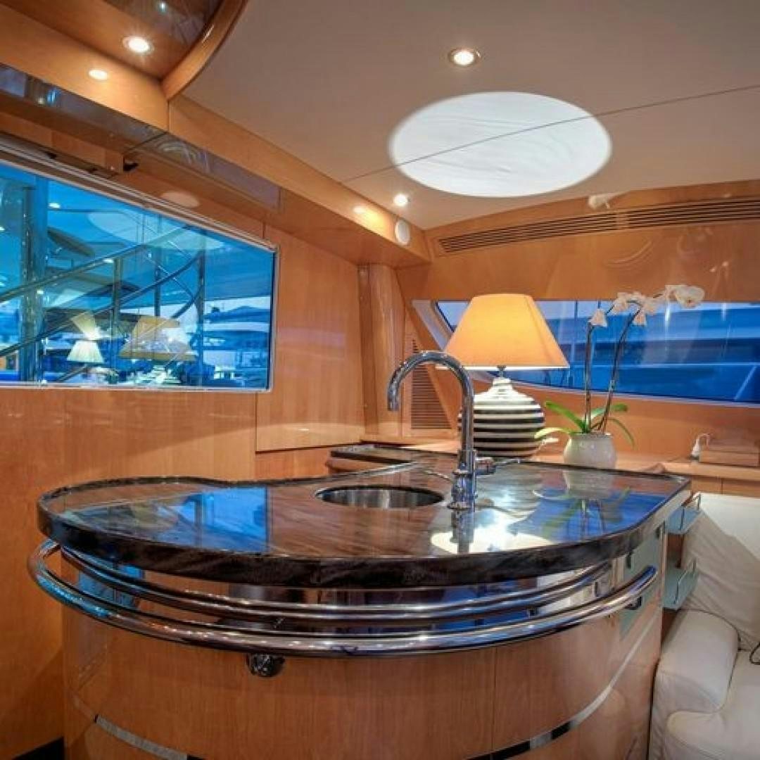 a bathroom with a large round sink aboard MATAU Yacht for Sale