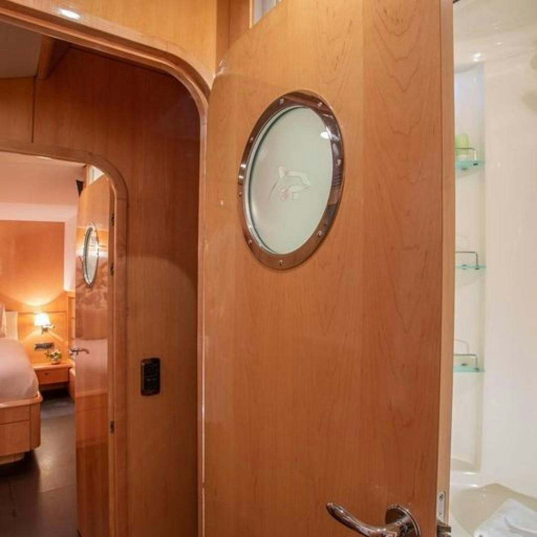 a mirror on a door aboard MATAU Yacht for Sale