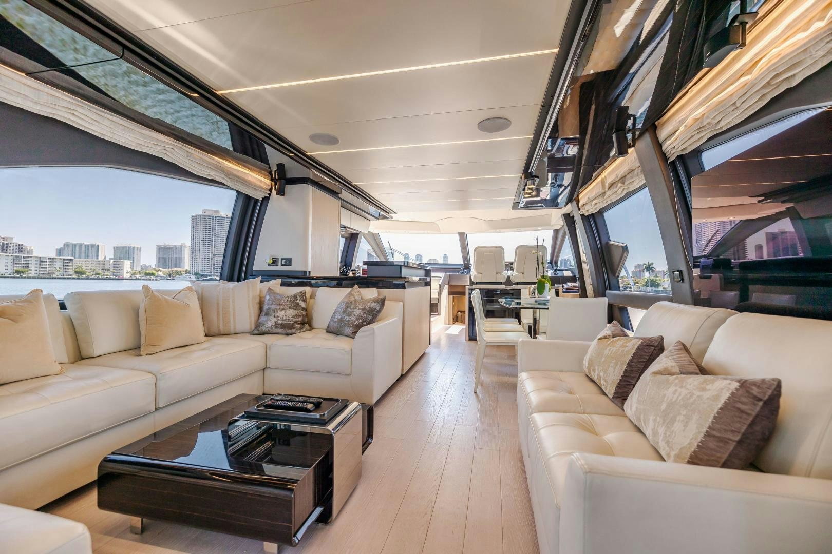a living room with a large window aboard MIREYA Yacht for Sale