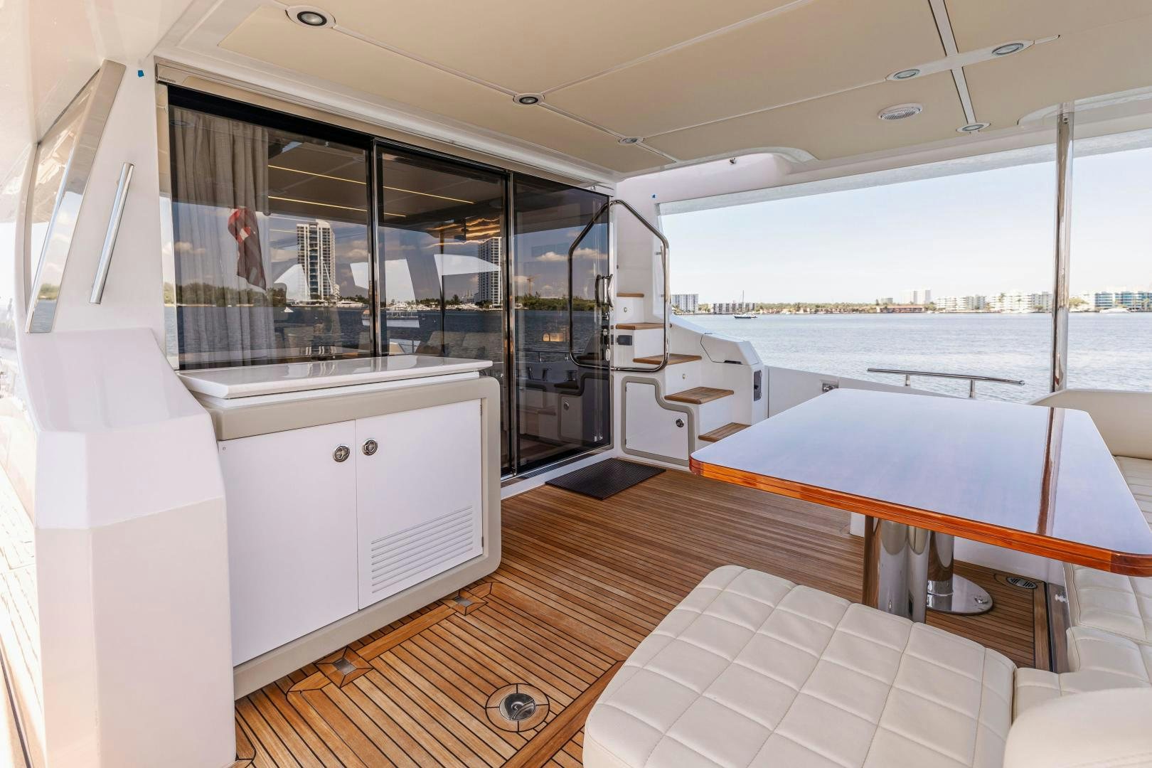 a room with a large window and a view of the water aboard MIREYA Yacht for Sale