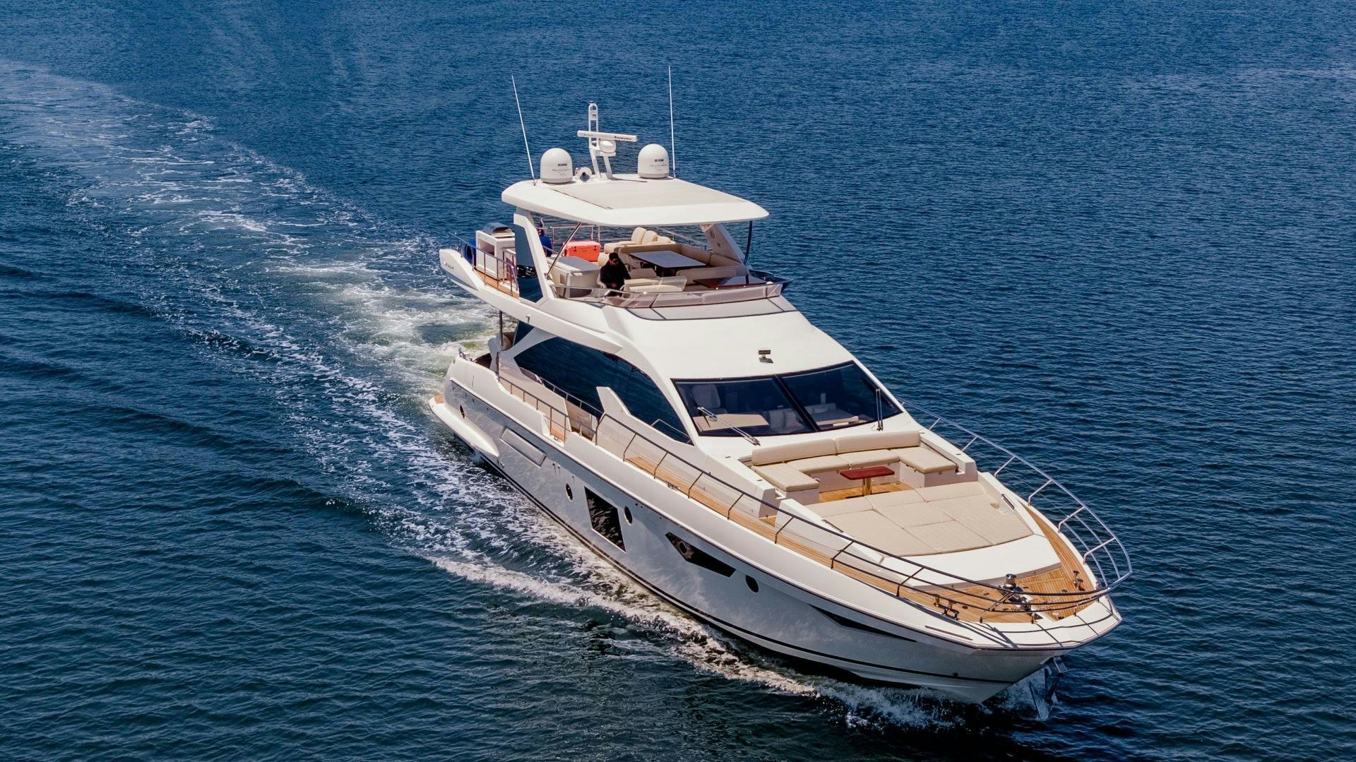 a white boat in the water aboard MIREYA Yacht for Sale