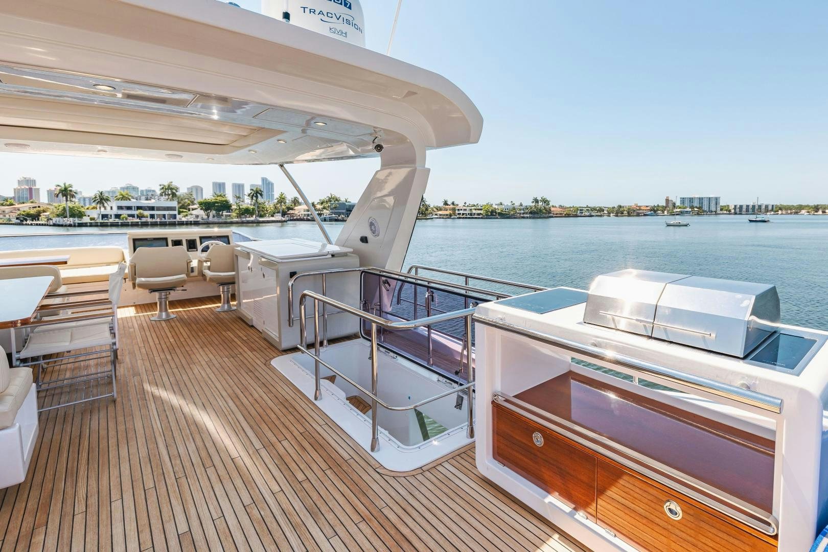a deck with a view of the water and boats aboard MIREYA Yacht for Sale