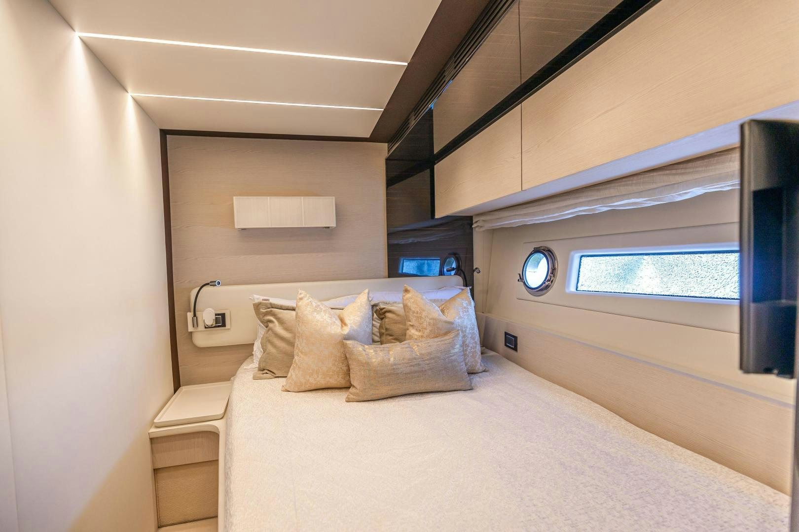 a bed in a room aboard MIREYA Yacht for Sale