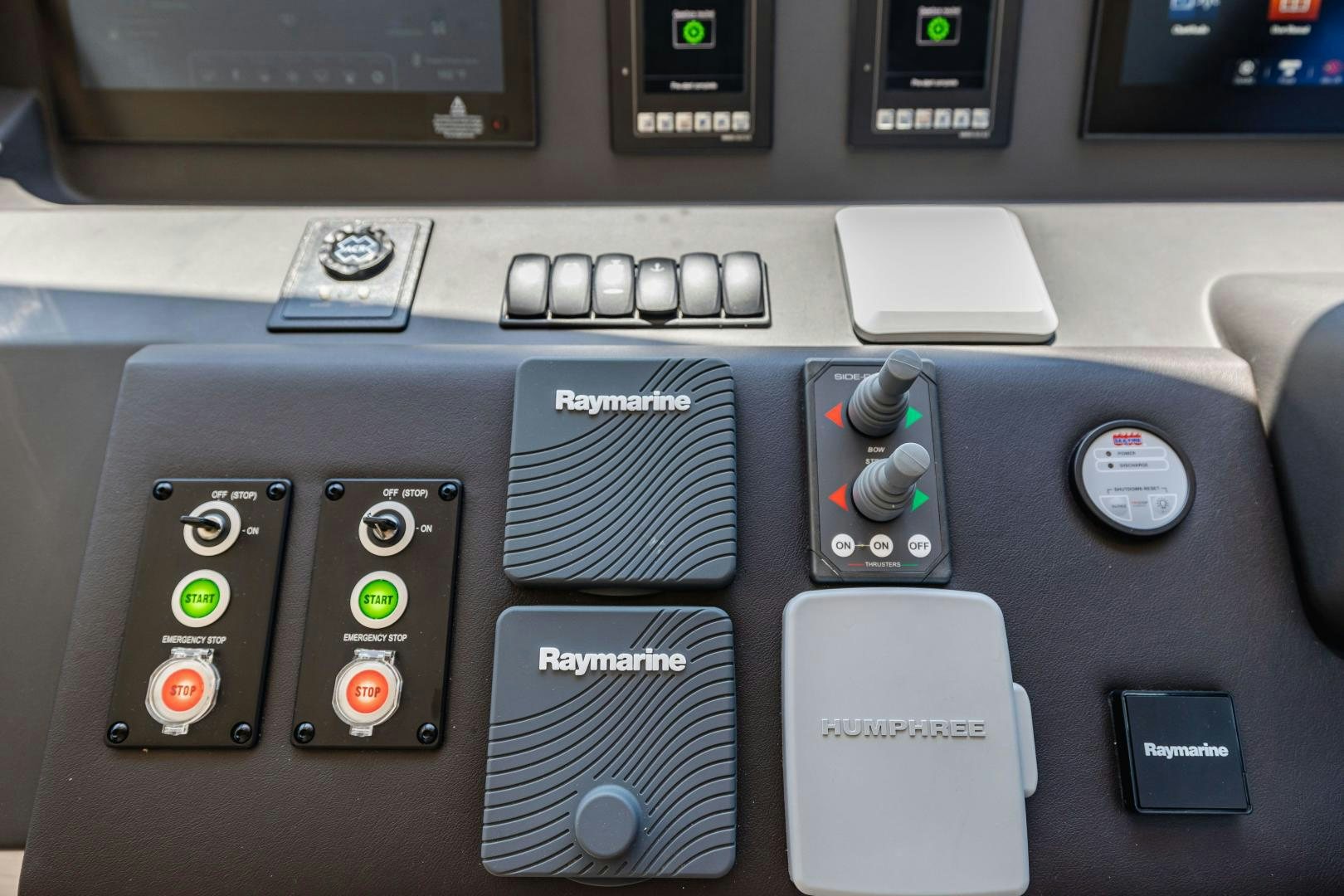 a group of remote controls aboard MIREYA Yacht for Sale