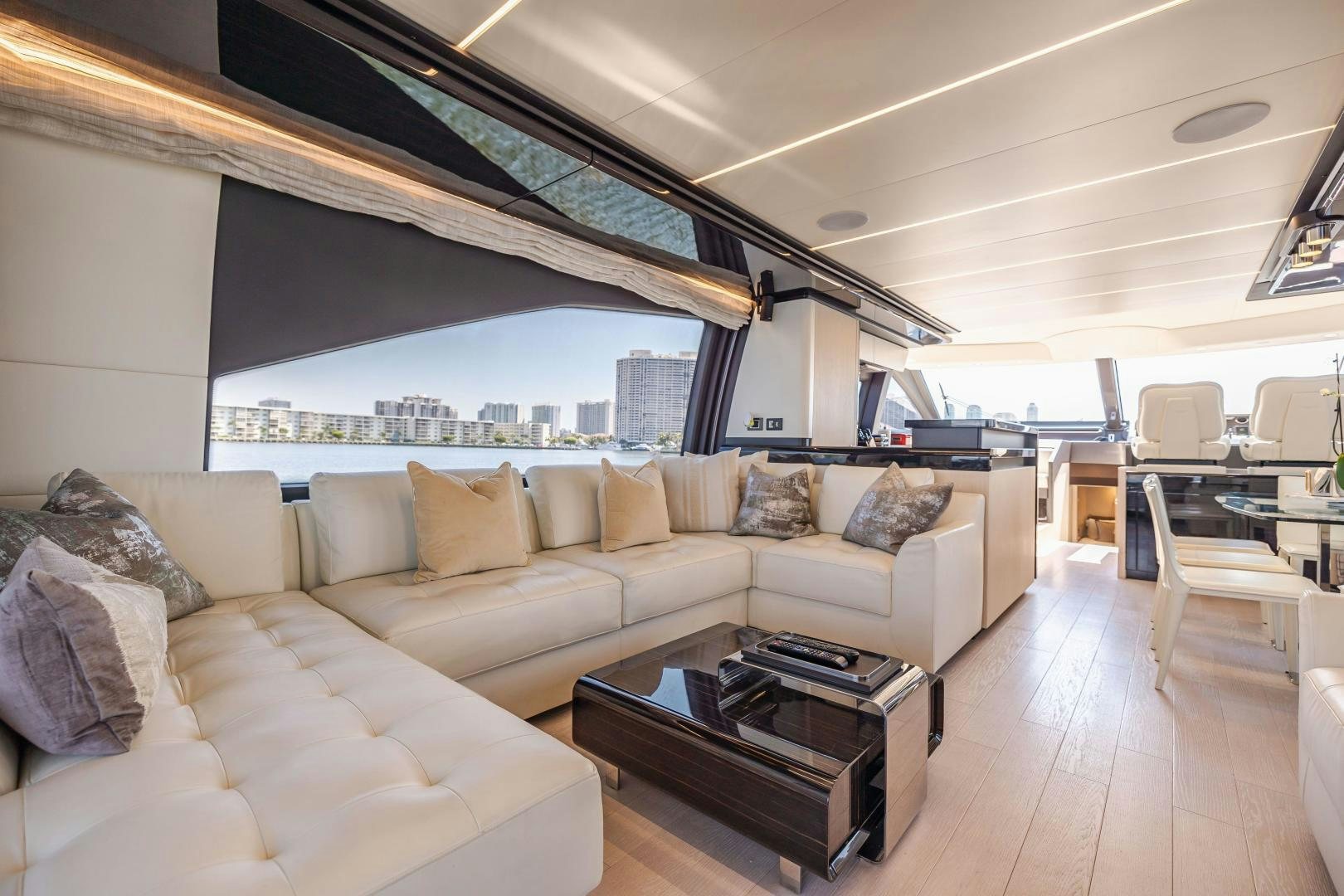 a living room with a large window aboard MIREYA Yacht for Sale