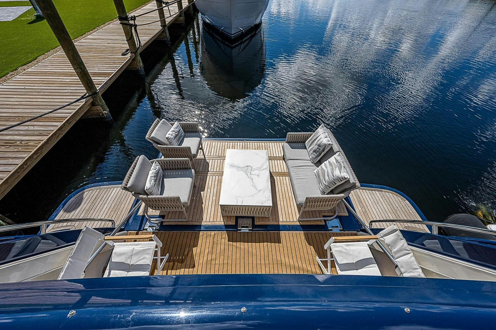 a pool with lounge chairs and a pool aboard LA BELLA VITA Yacht for Sale