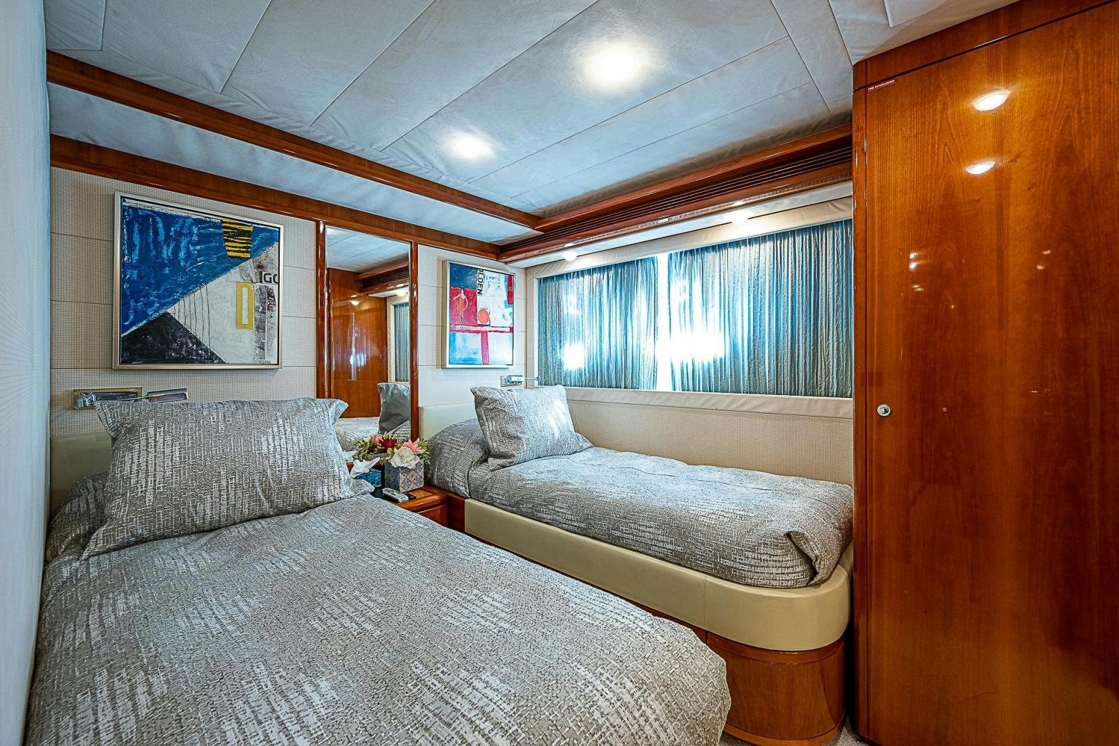 a couple of beds in a room aboard LA BELLA VITA Yacht for Sale