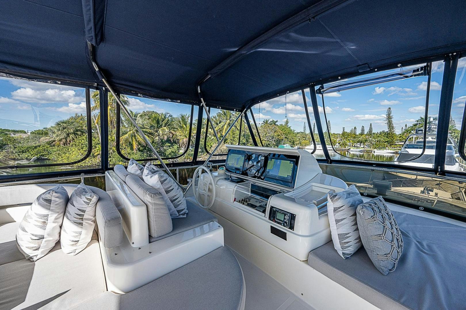 interior of a car with a large window and a view of the trees aboard LA BELLA VITA Yacht for Sale
