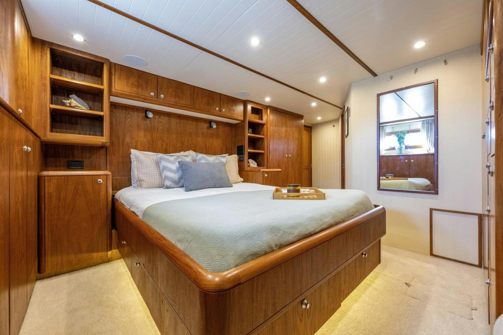a bed in a room aboard CHEEMAUN Yacht for Sale