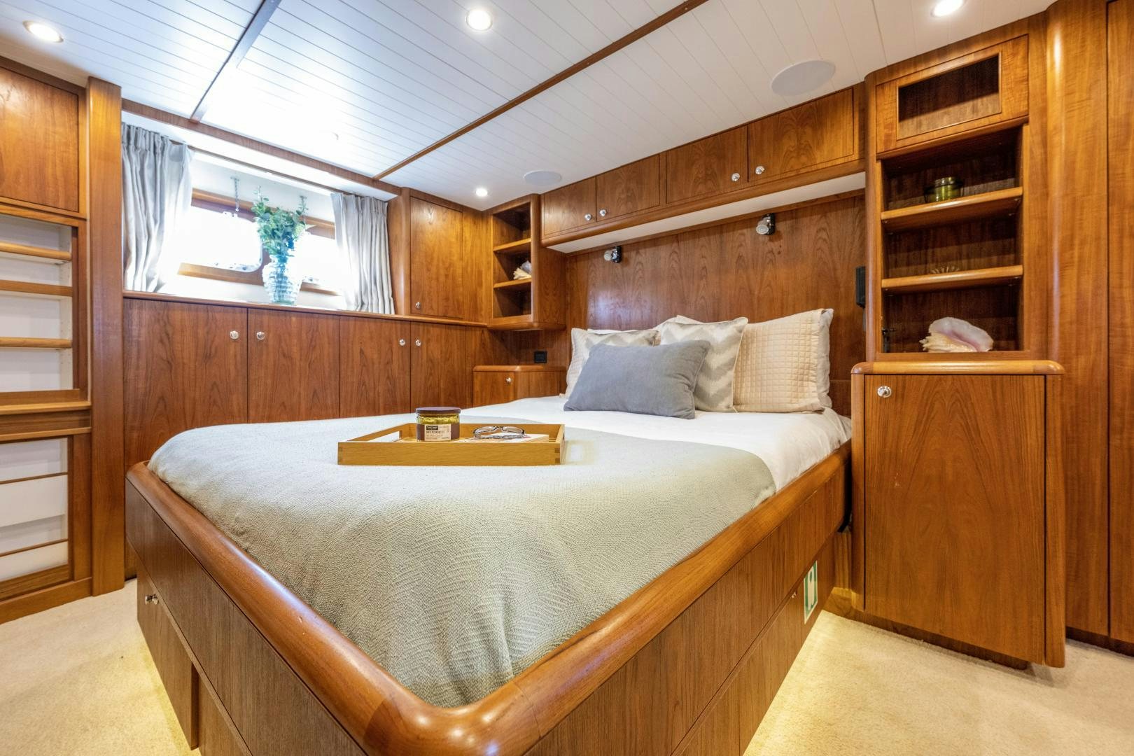a bed in a room aboard CHEEMAUN Yacht for Sale