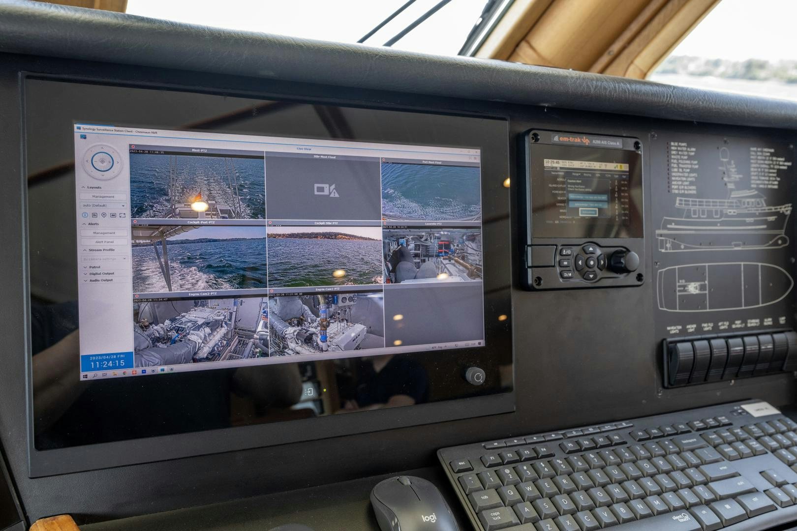 a computer with a screen and keyboard aboard CHEEMAUN Yacht for Sale