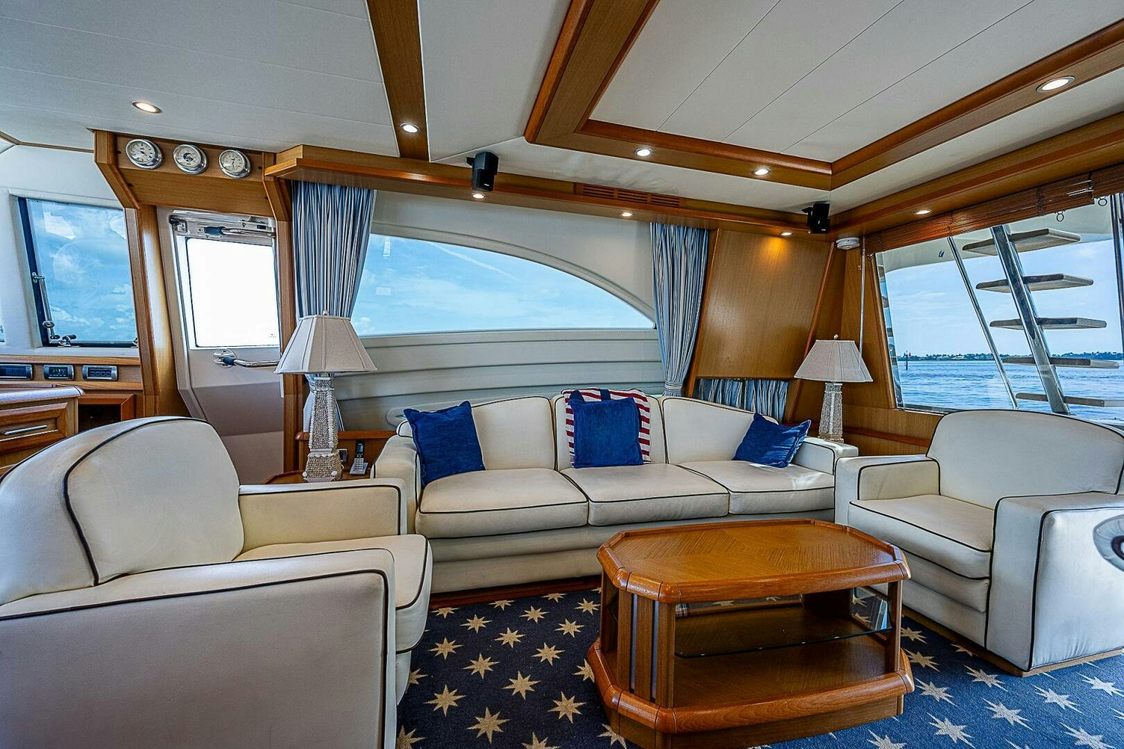a living room with a large window aboard KNOT NANNY'S Yacht for Sale
