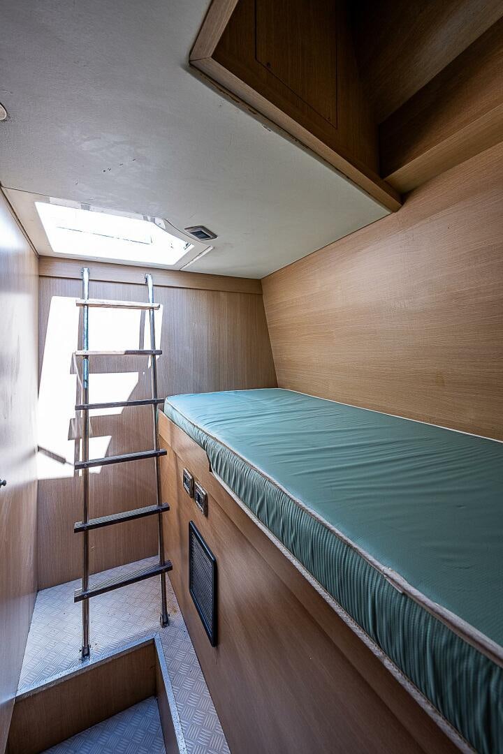 a bunk bed in a room aboard KNOT NANNY'S Yacht for Sale