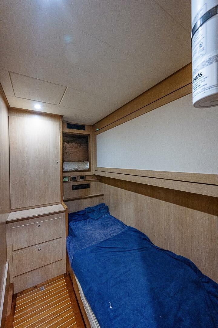 a bed in a room aboard KNOT NANNY'S Yacht for Sale