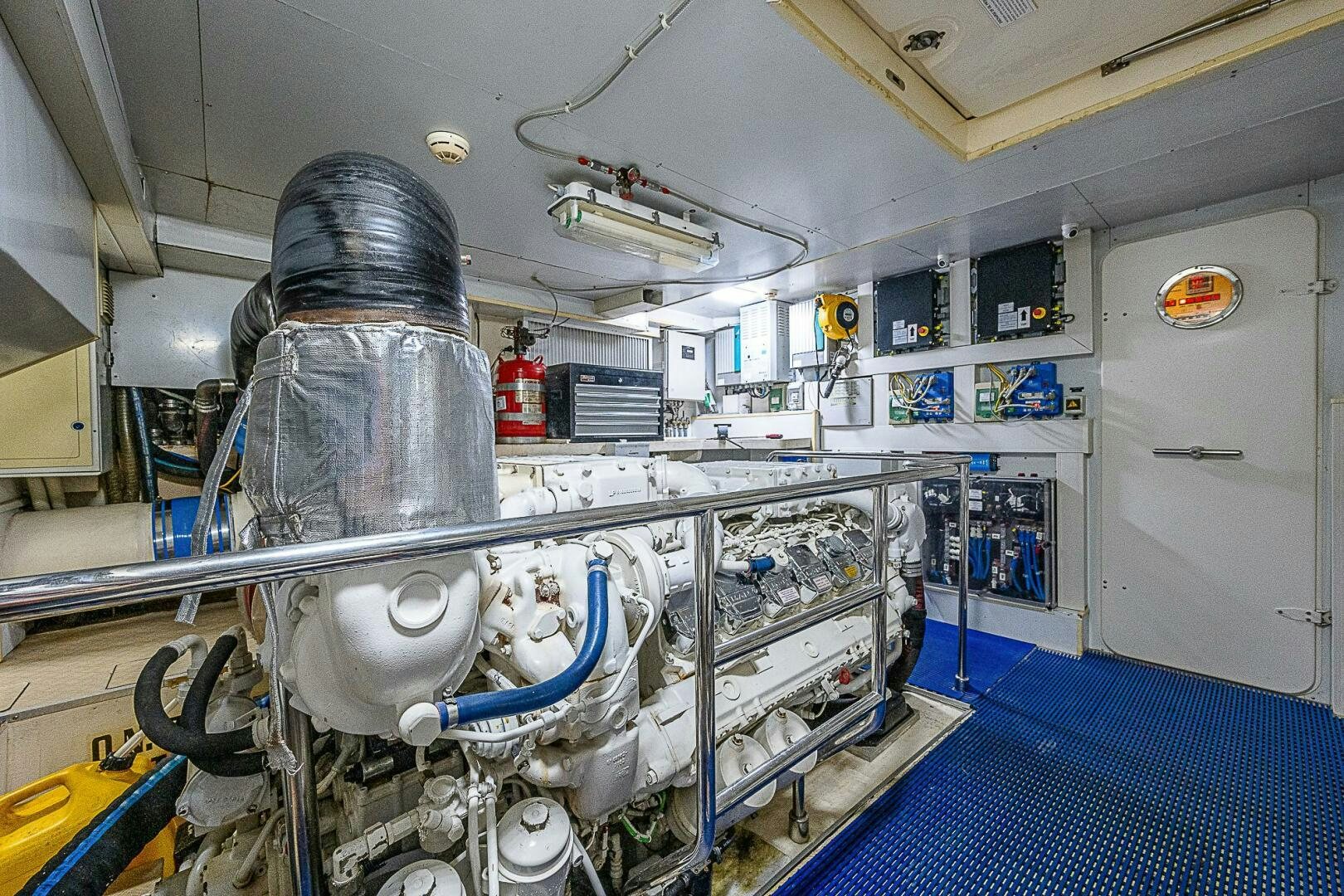 a person in a mask in a room with machines aboard KNOT NANNY'S Yacht for Sale