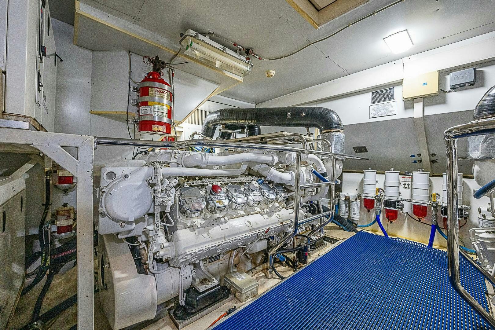 a room with white pipes aboard KNOT NANNY'S Yacht for Sale