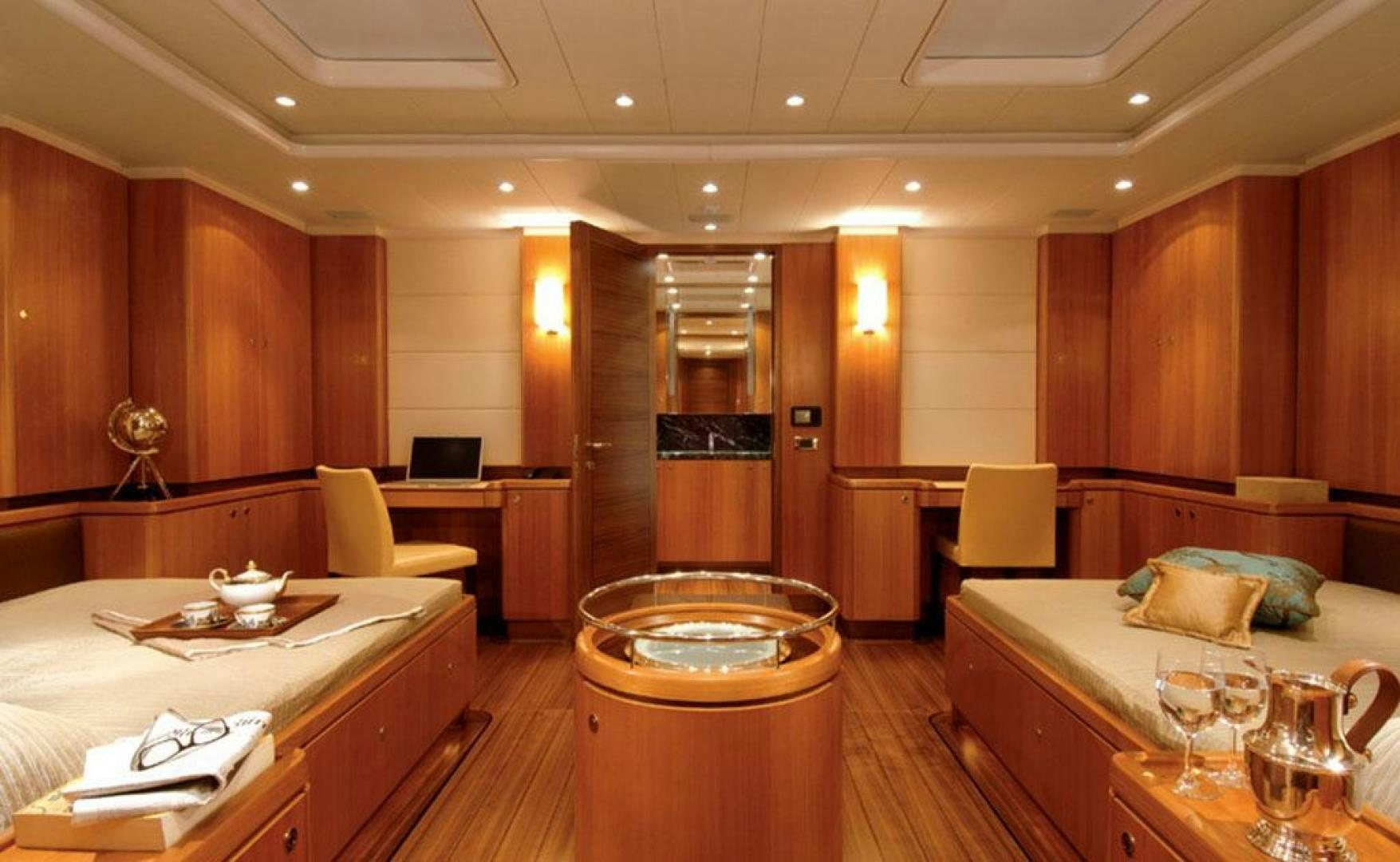 a large room with wooden cabinets aboard ARISTARCHOS Yacht for Charter