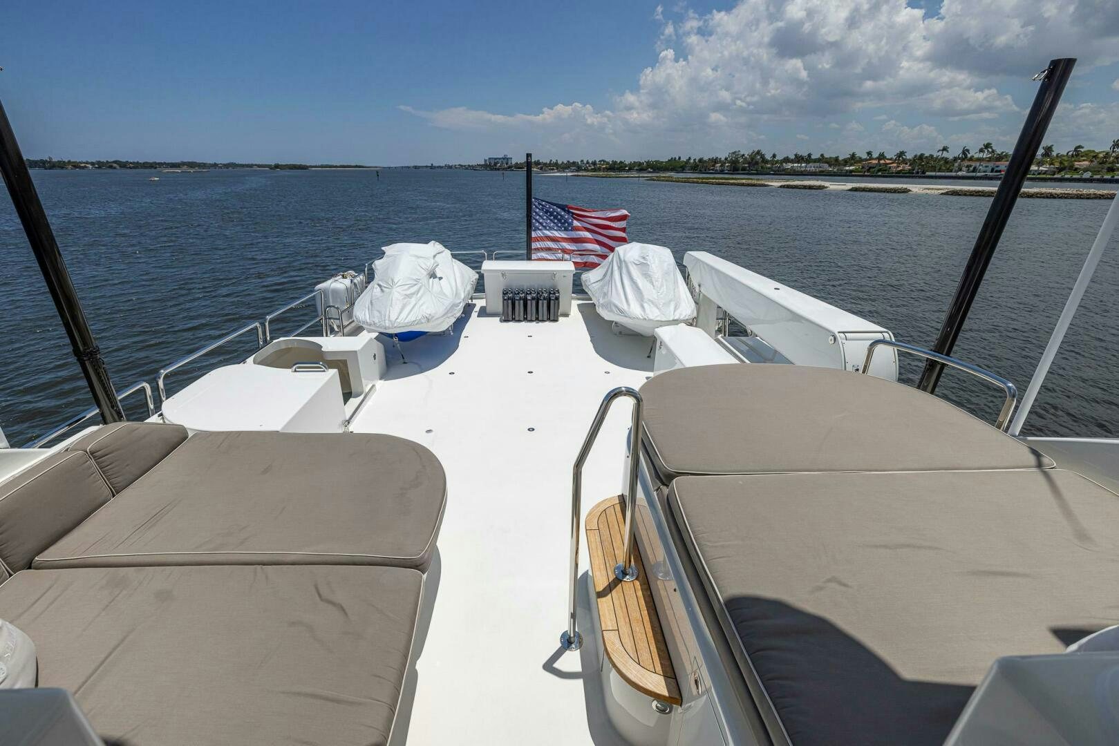 a boat with a flag on the front aboard SEAHAWK Yacht for Sale