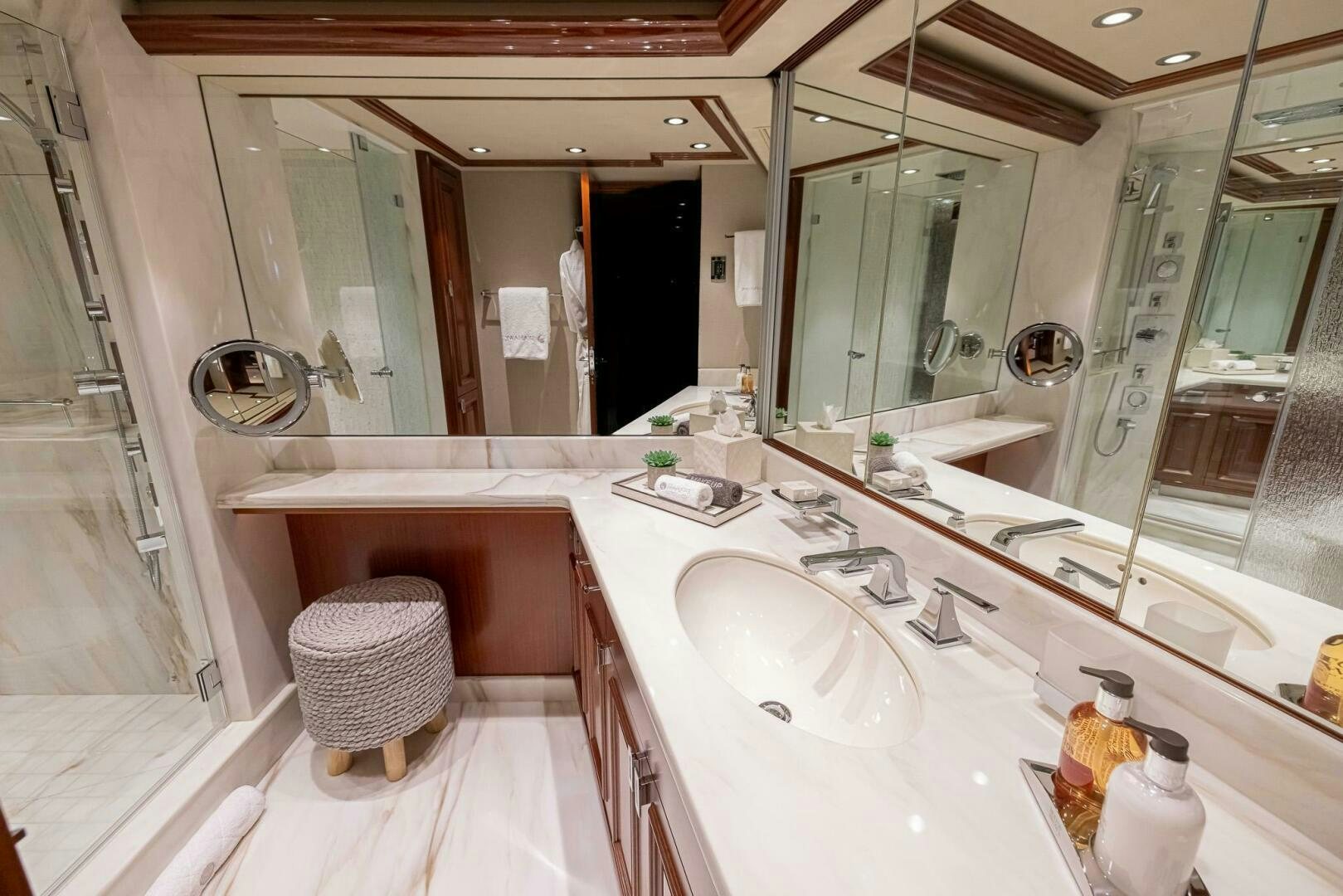 a bathroom with a large mirror aboard SEAHAWK Yacht for Sale