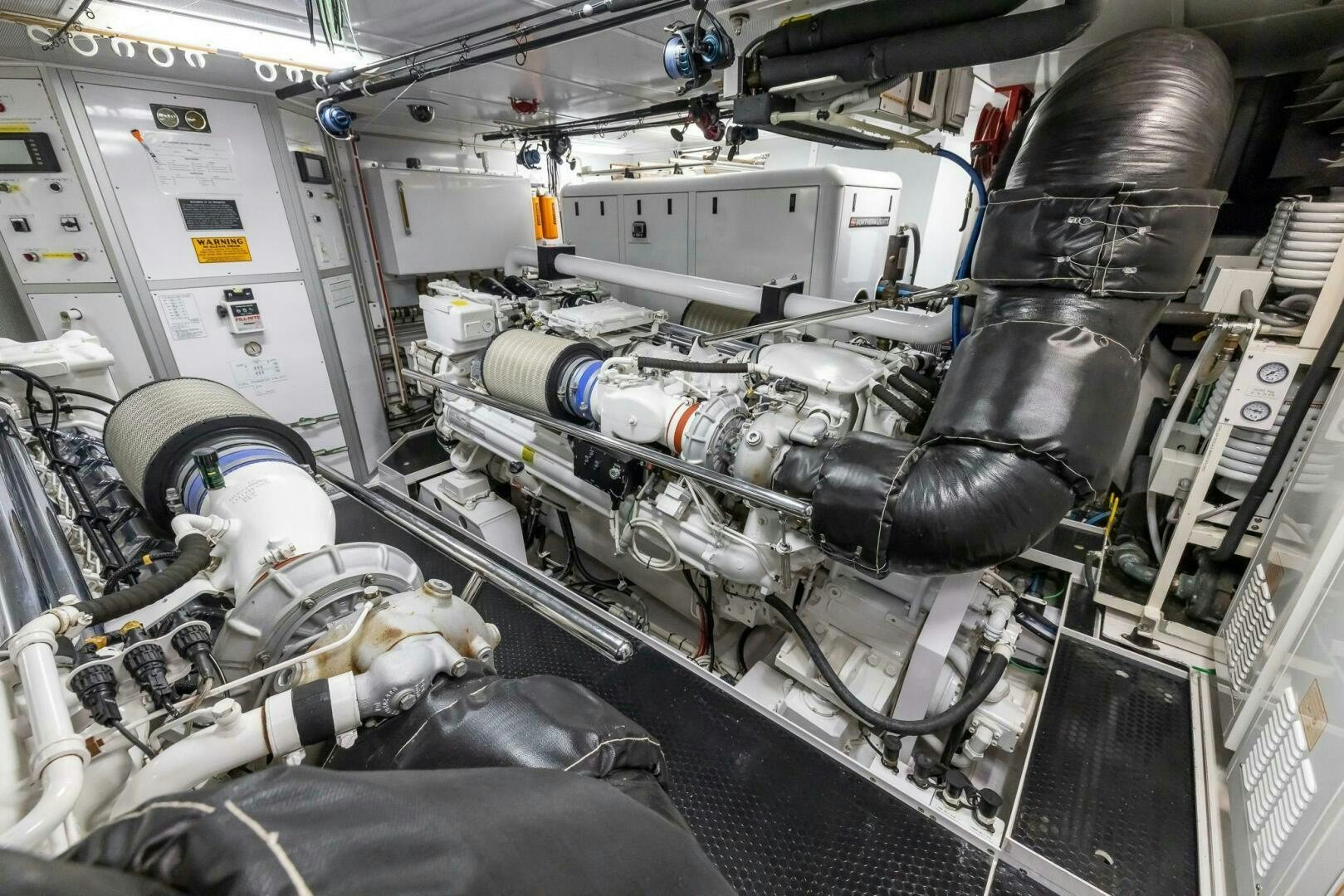 a car engine in a garage aboard SEAHAWK Yacht for Sale