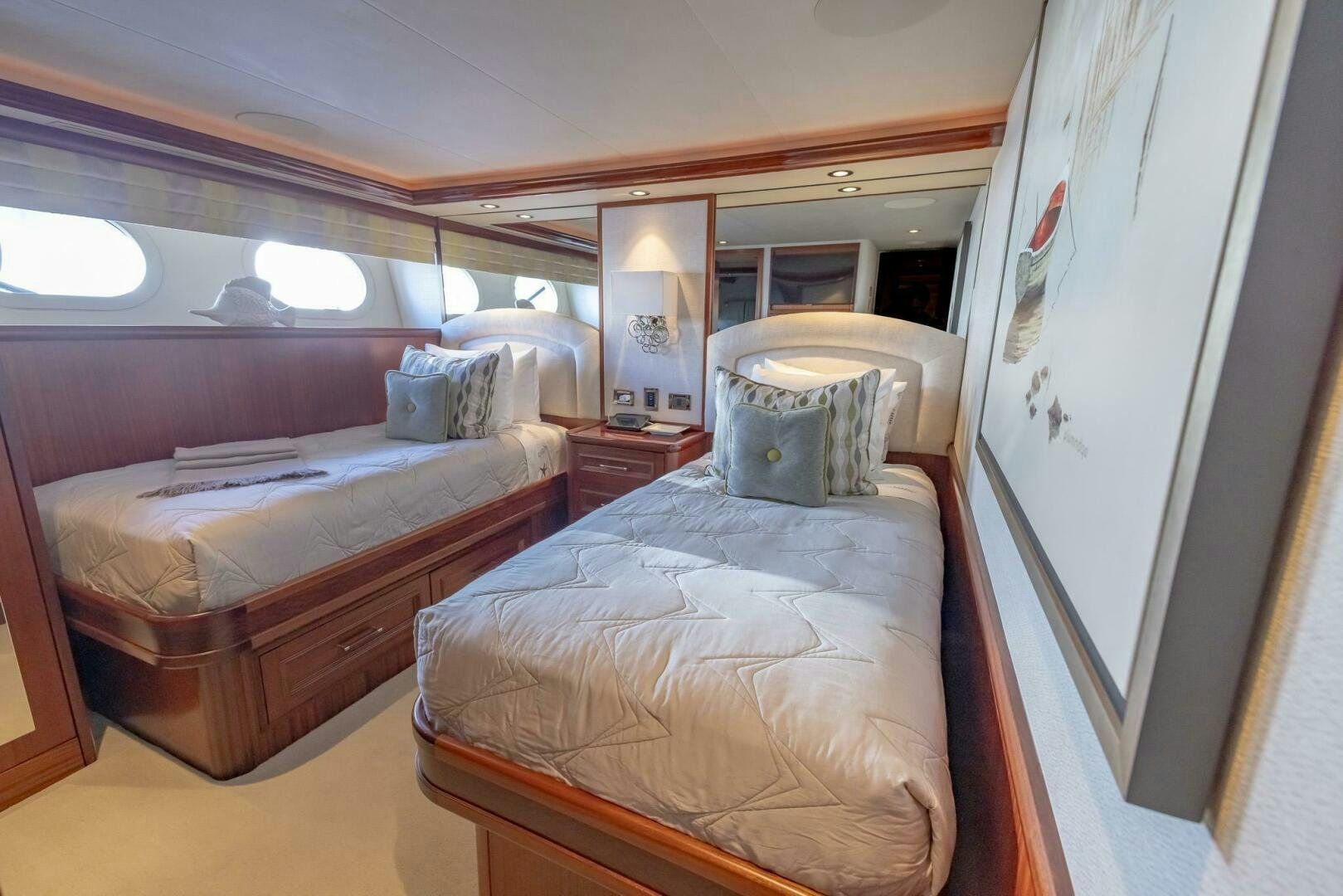 a couple of beds in a room aboard SEAHAWK Yacht for Sale