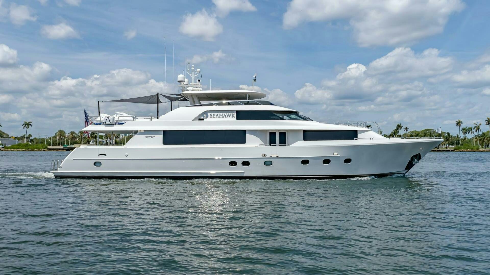 a white yacht on the water aboard SEAHAWK Yacht for Sale