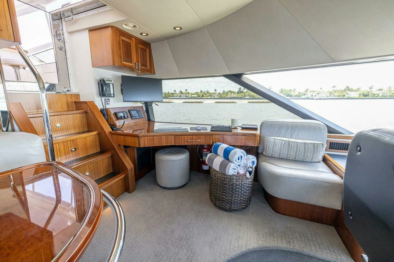 a living room with a couch and a table aboard SEAHAWK Yacht for Sale
