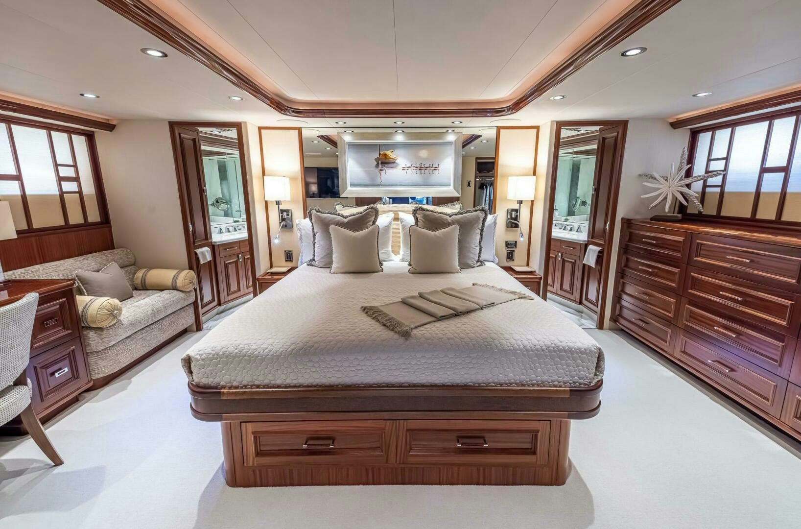 a large bedroom with a large bed aboard SEAHAWK Yacht for Sale