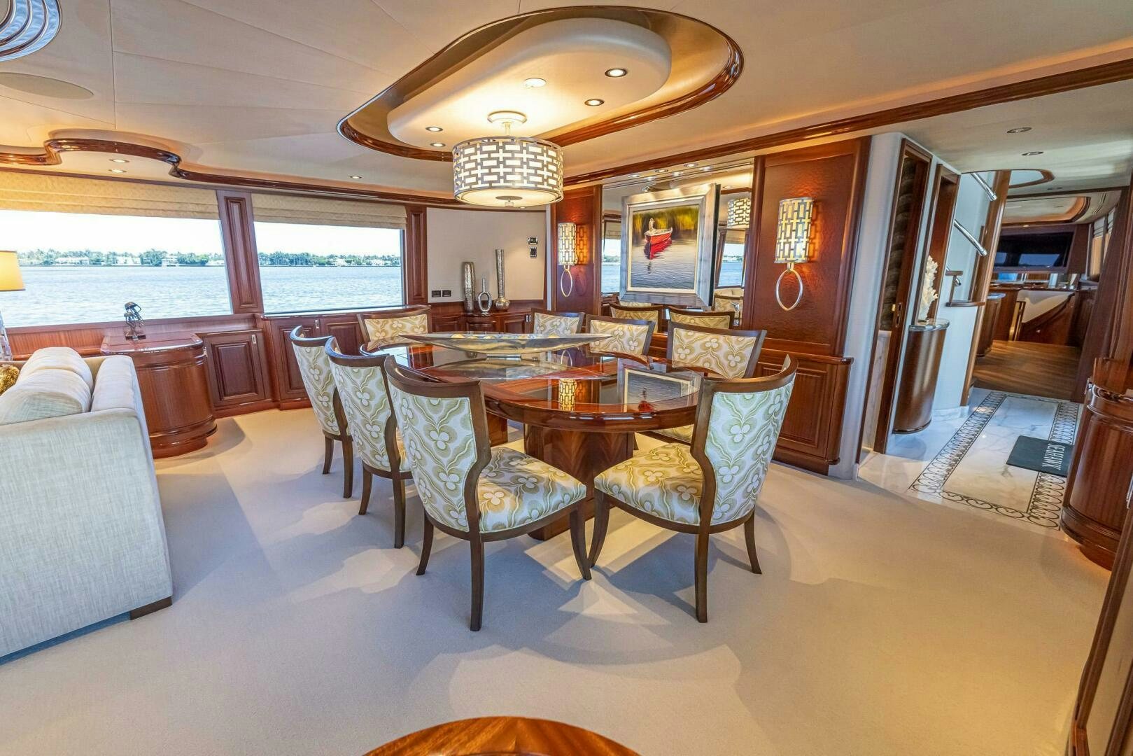 a large dining room with a large table and chairs aboard SEAHAWK Yacht for Sale