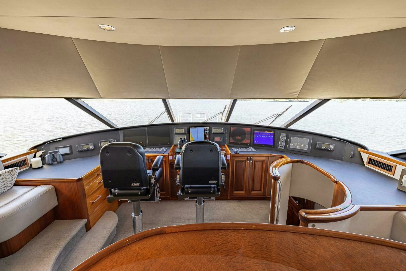 a room with chairs and a table aboard SEAHAWK Yacht for Sale