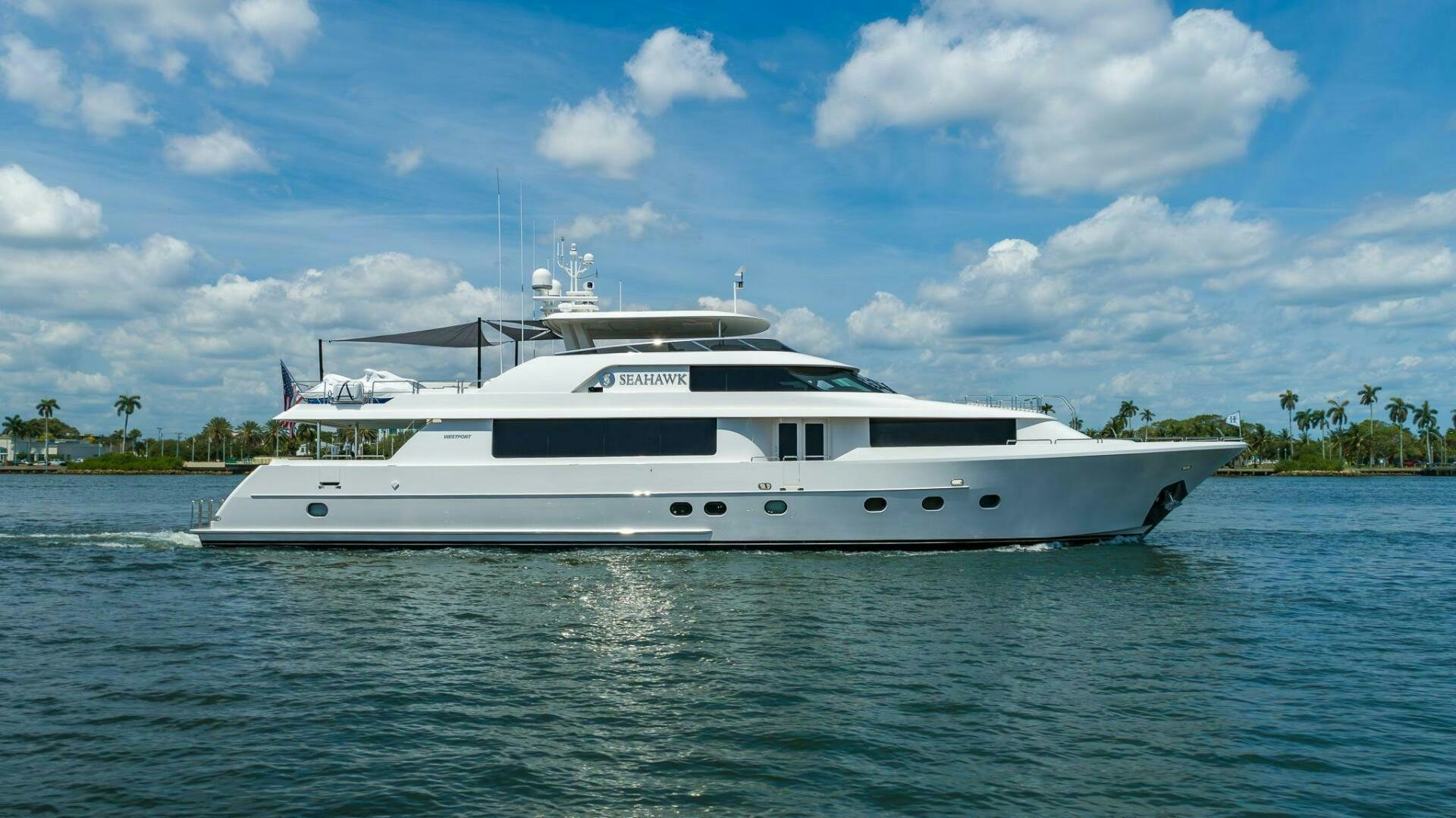 a white yacht in the water aboard SEAHAWK Yacht for Sale