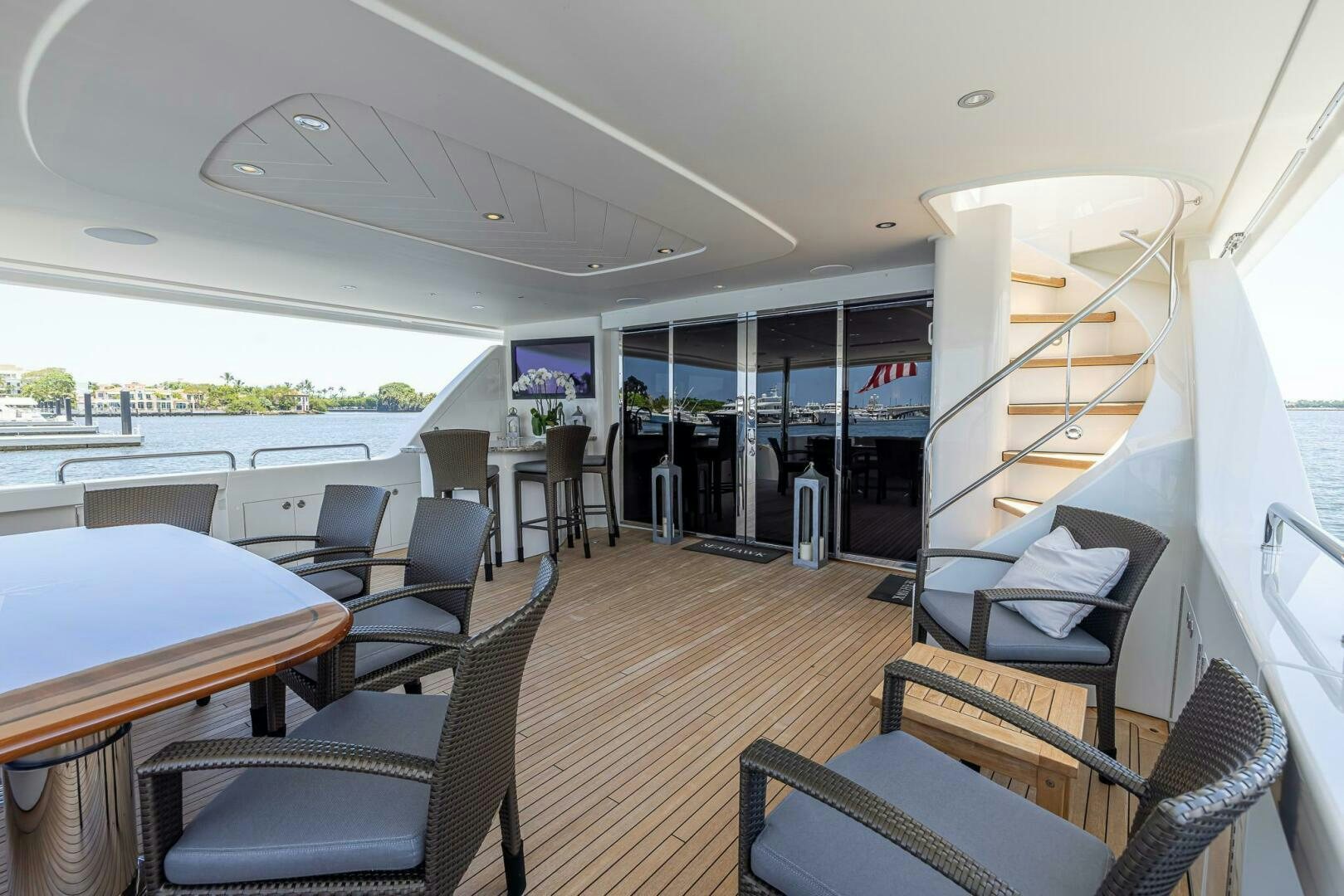 a boat with a table and chairs aboard SEAHAWK Yacht for Sale