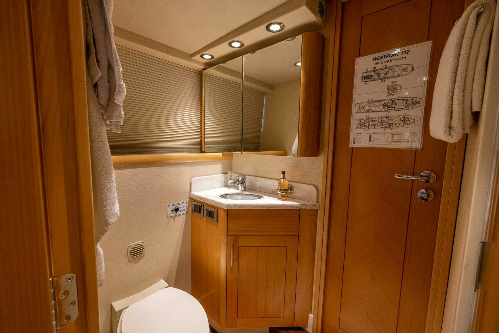a bathroom with a sink and a toilet aboard SEAHAWK Yacht for Sale