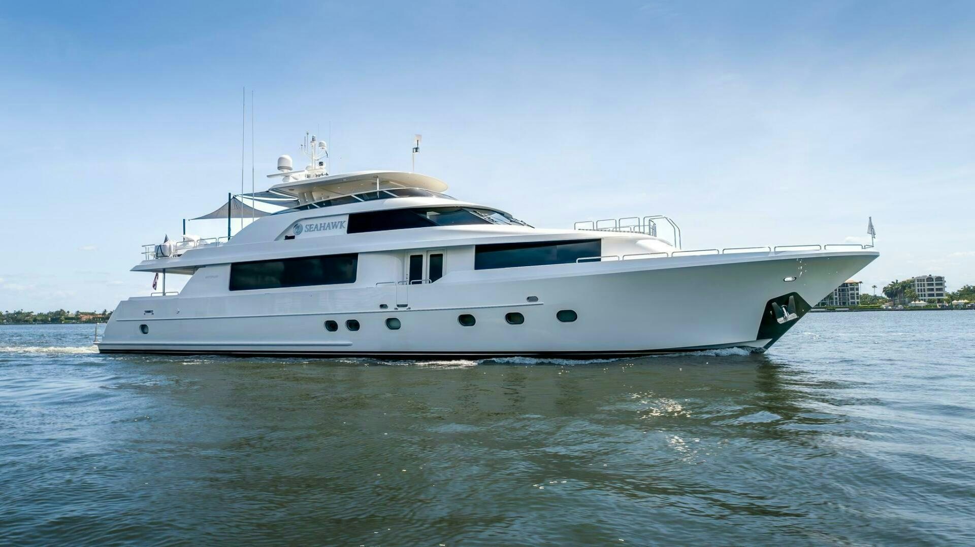 a white yacht on the water aboard SEAHAWK Yacht for Sale