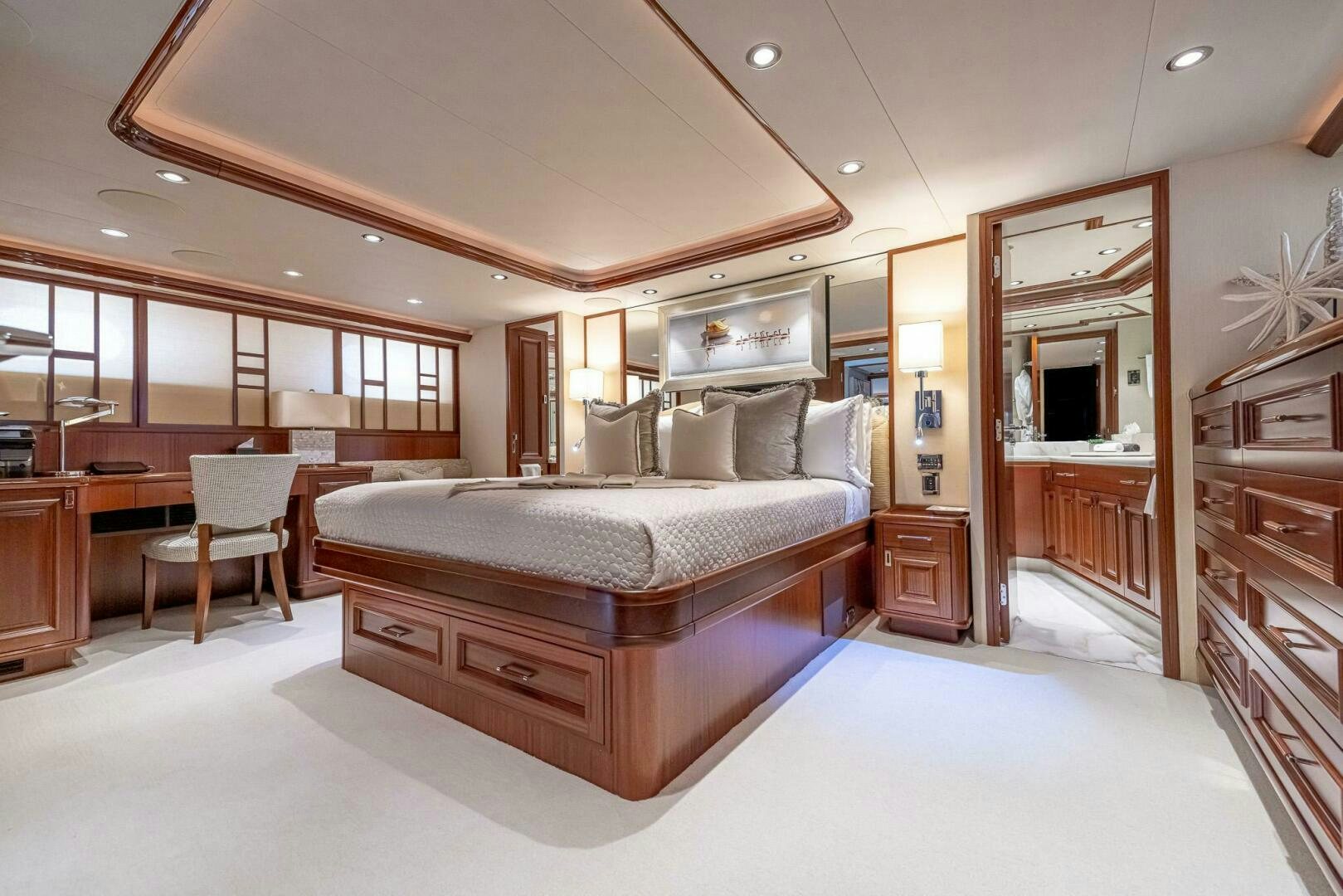a large bedroom with a large bed aboard SEAHAWK Yacht for Sale