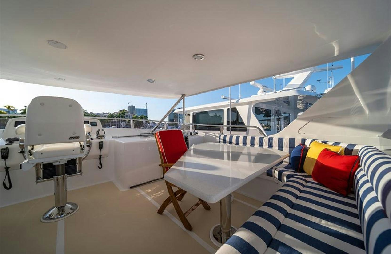 a boat with a chair and a table on the deck aboard JULIANNE NAME RESERVED Yacht for Sale