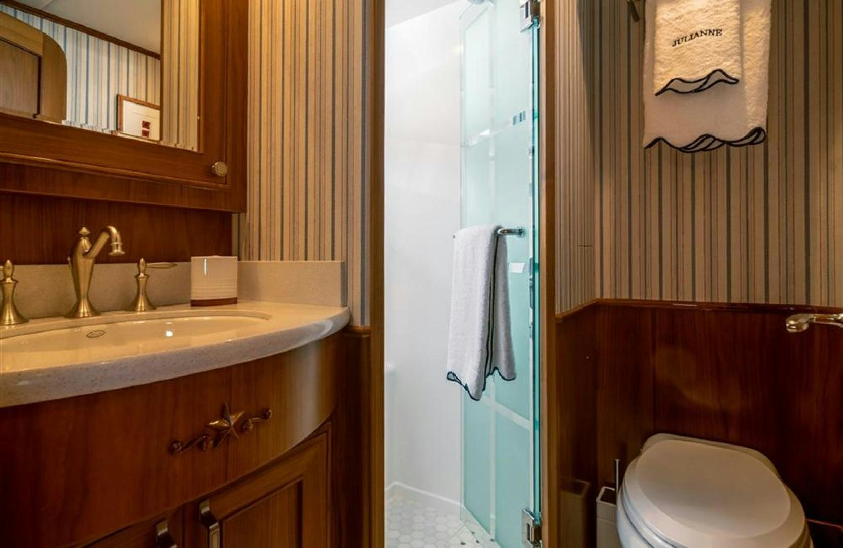 a bathroom with a sink and toilet aboard JULIANNE NAME RESERVED Yacht for Sale
