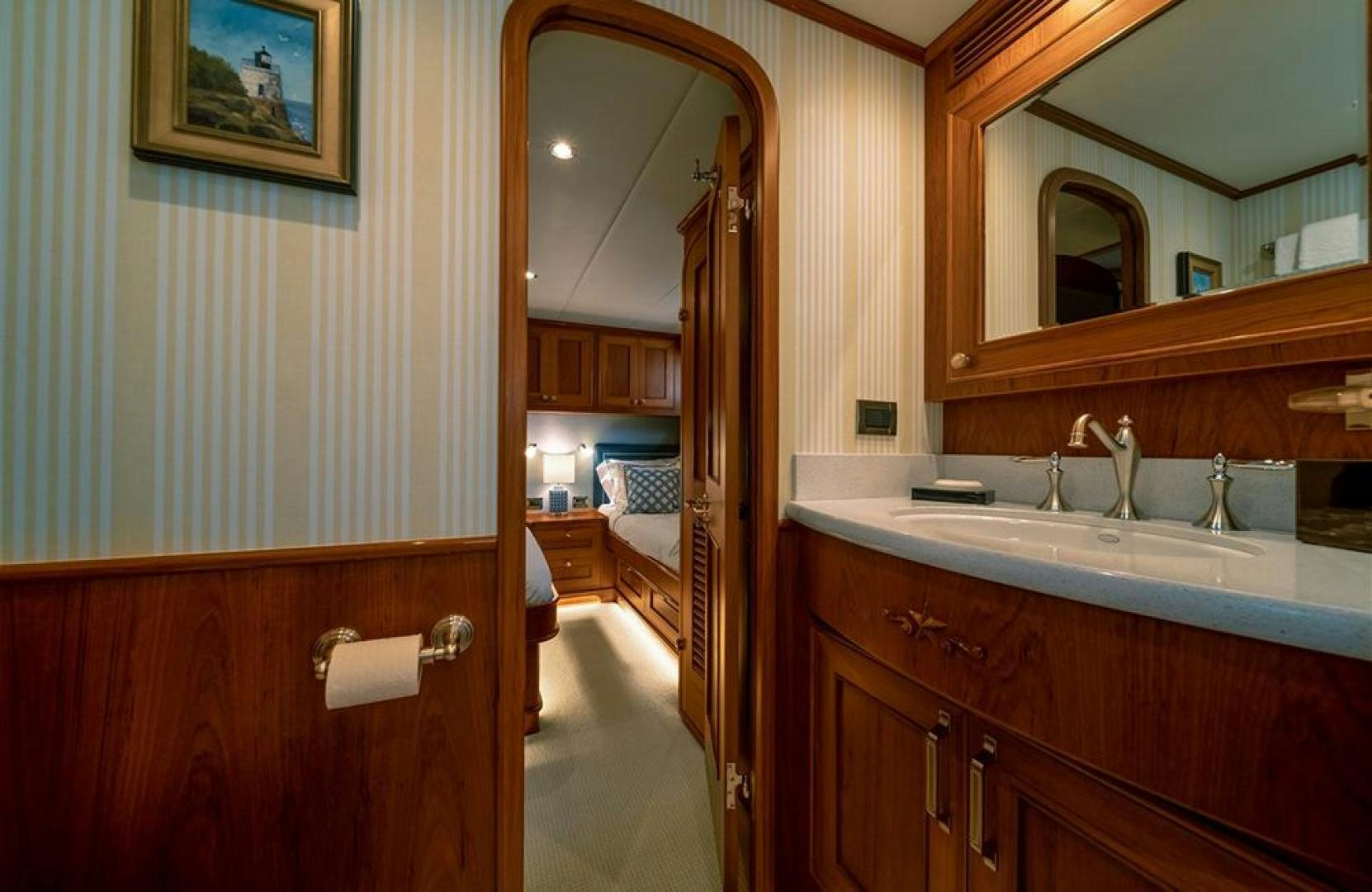 a bathroom with a sink and a mirror aboard JULIANNE NAME RESERVED Yacht for Sale