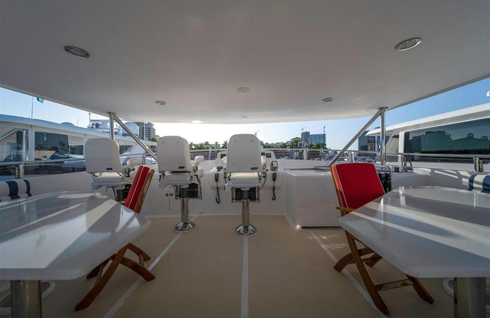 a room with chairs and tables aboard JULIANNE NAME RESERVED Yacht for Sale