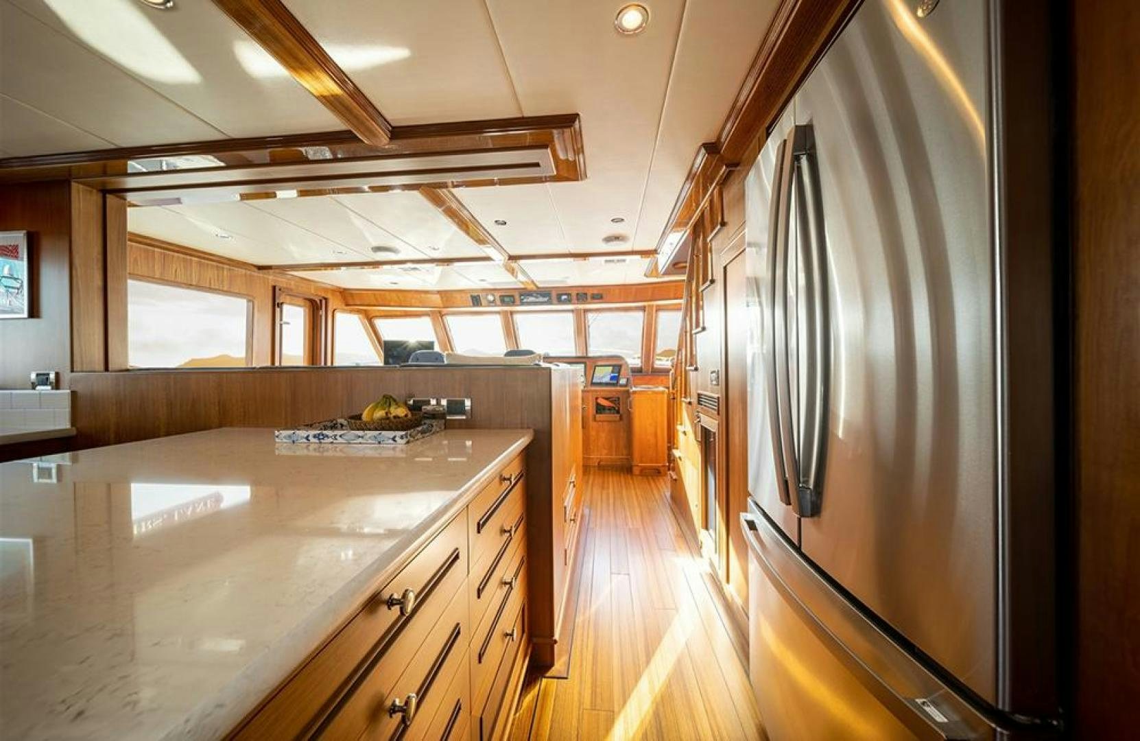 a kitchen with a refrigerator and a microwave oven aboard JULIANNE NAME RESERVED Yacht for Sale