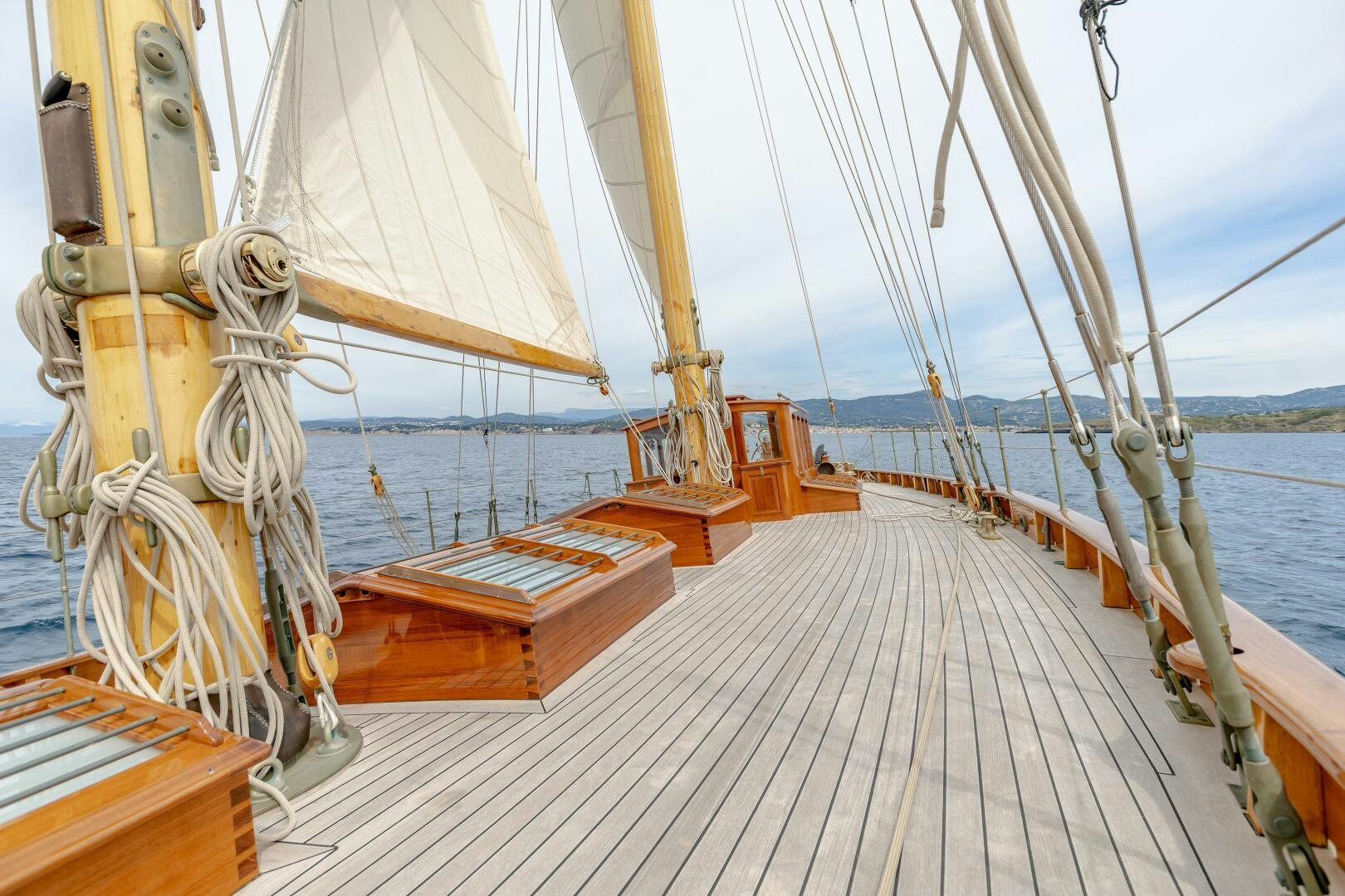 a sailboat on a deck aboard ARMIDE Yacht for Sale