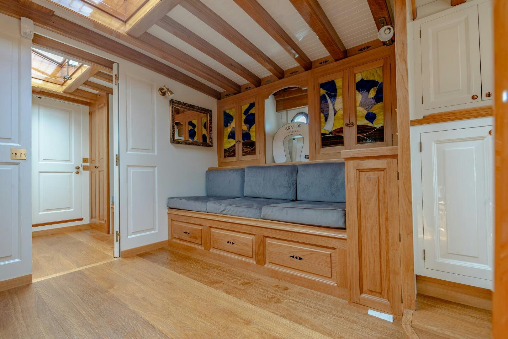 a living room with a couch aboard ARMIDE Yacht for Sale