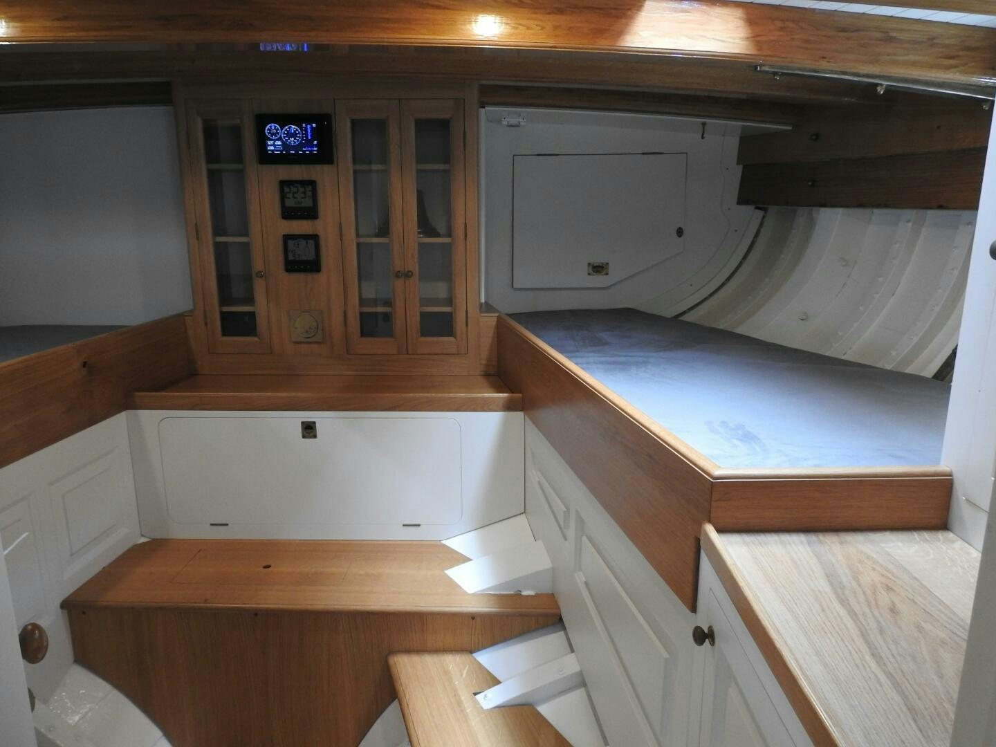 a room with a bed and a desk aboard ARMIDE Yacht for Sale