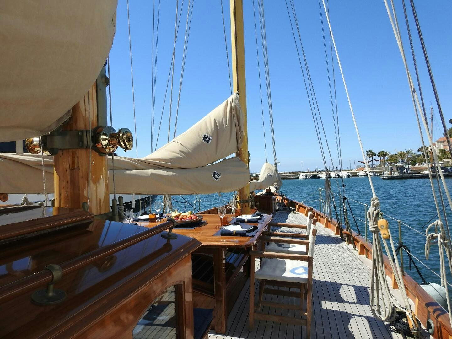 a boat dock with boats aboard ARMIDE Yacht for Sale