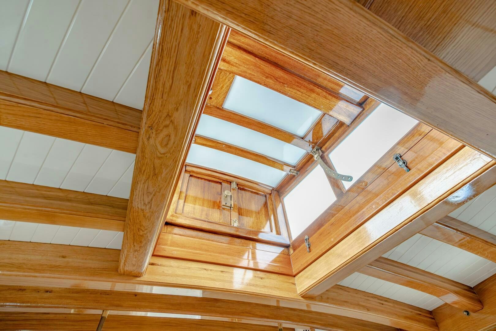 a wooden staircase with wooden floors aboard ARMIDE Yacht for Sale