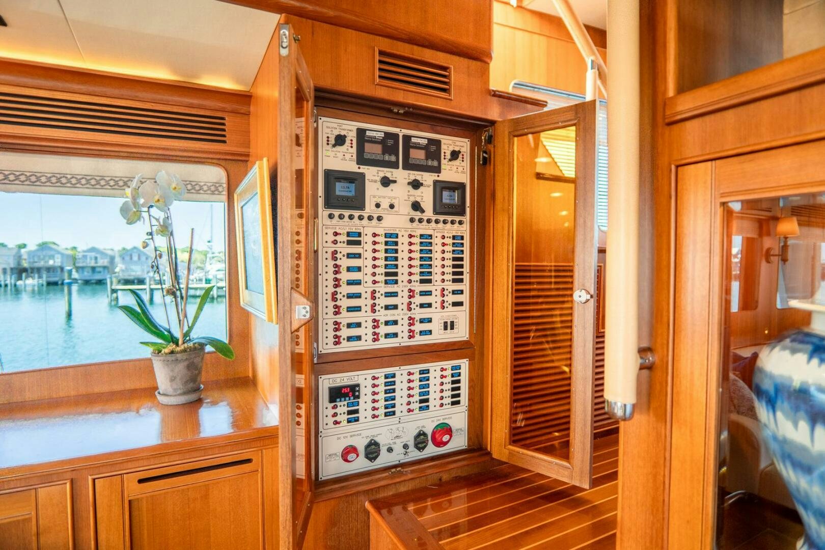 a room with a computer and a plant in it aboard QUARRY Yacht for Sale