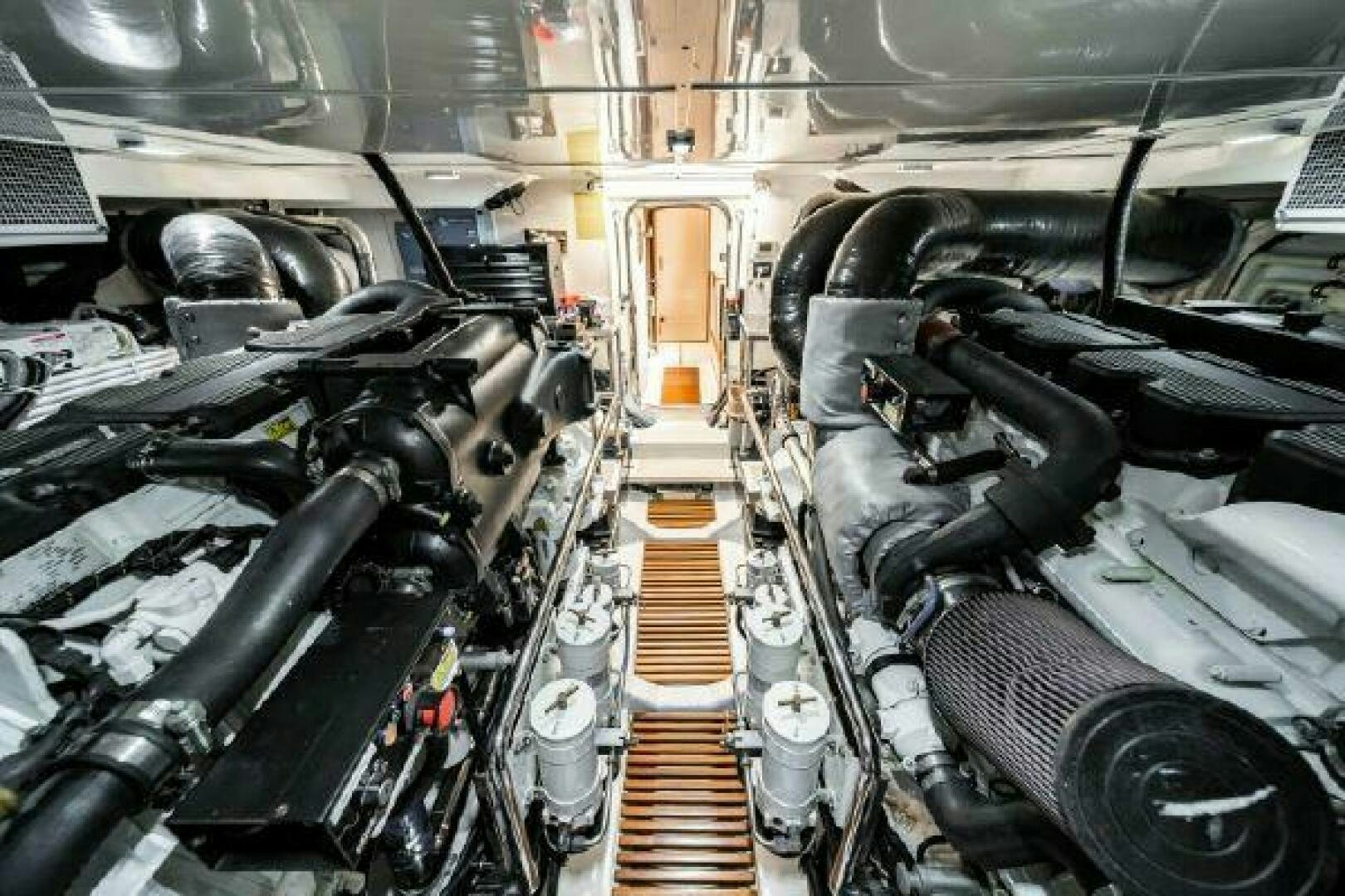 a large room with a large group of pipes and machinery aboard QUARRY Yacht for Sale