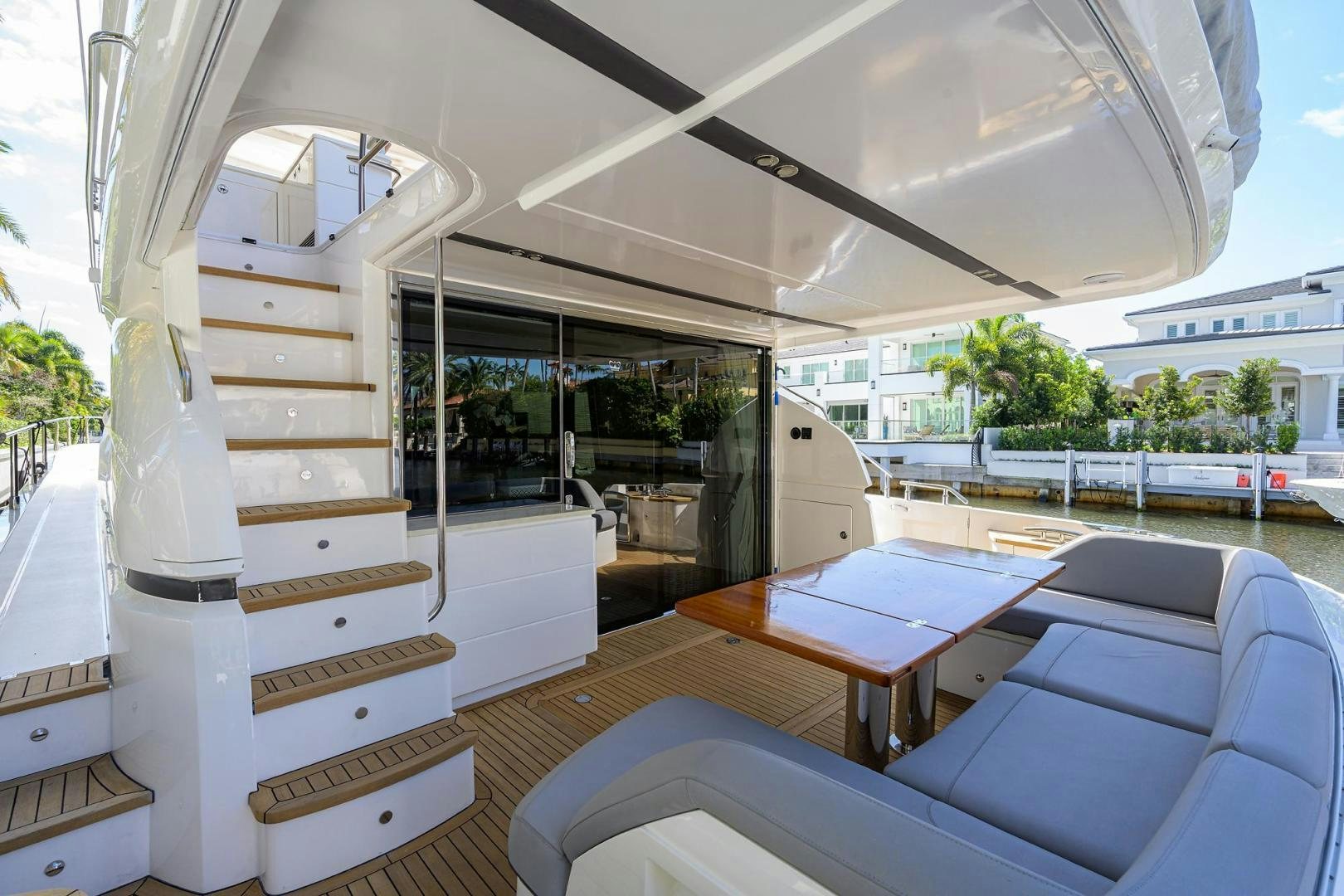 a room with a table and chairs aboard KHATCH YOU LATER Yacht for Sale