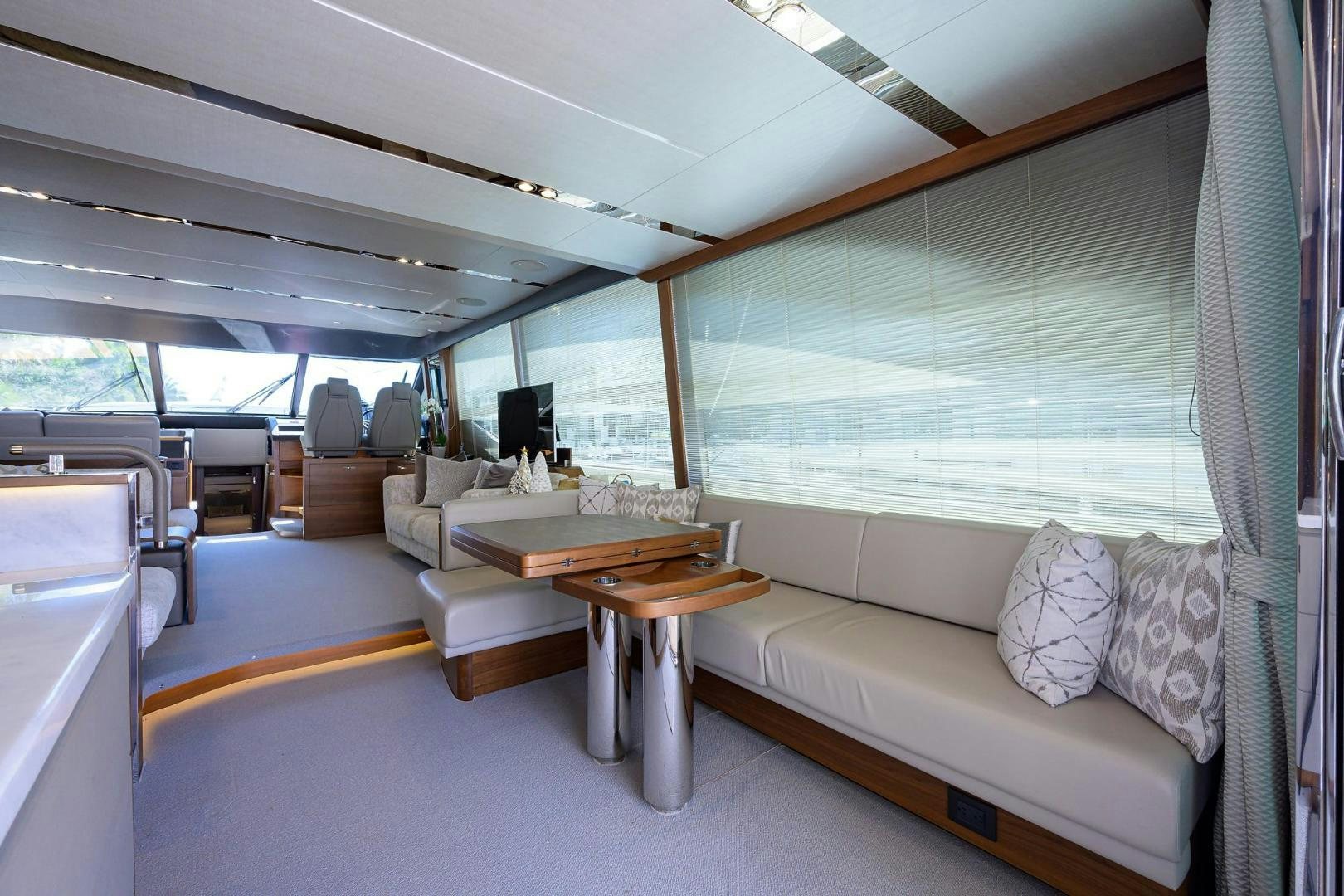 a room with a couch and a table aboard KHATCH YOU LATER Yacht for Sale