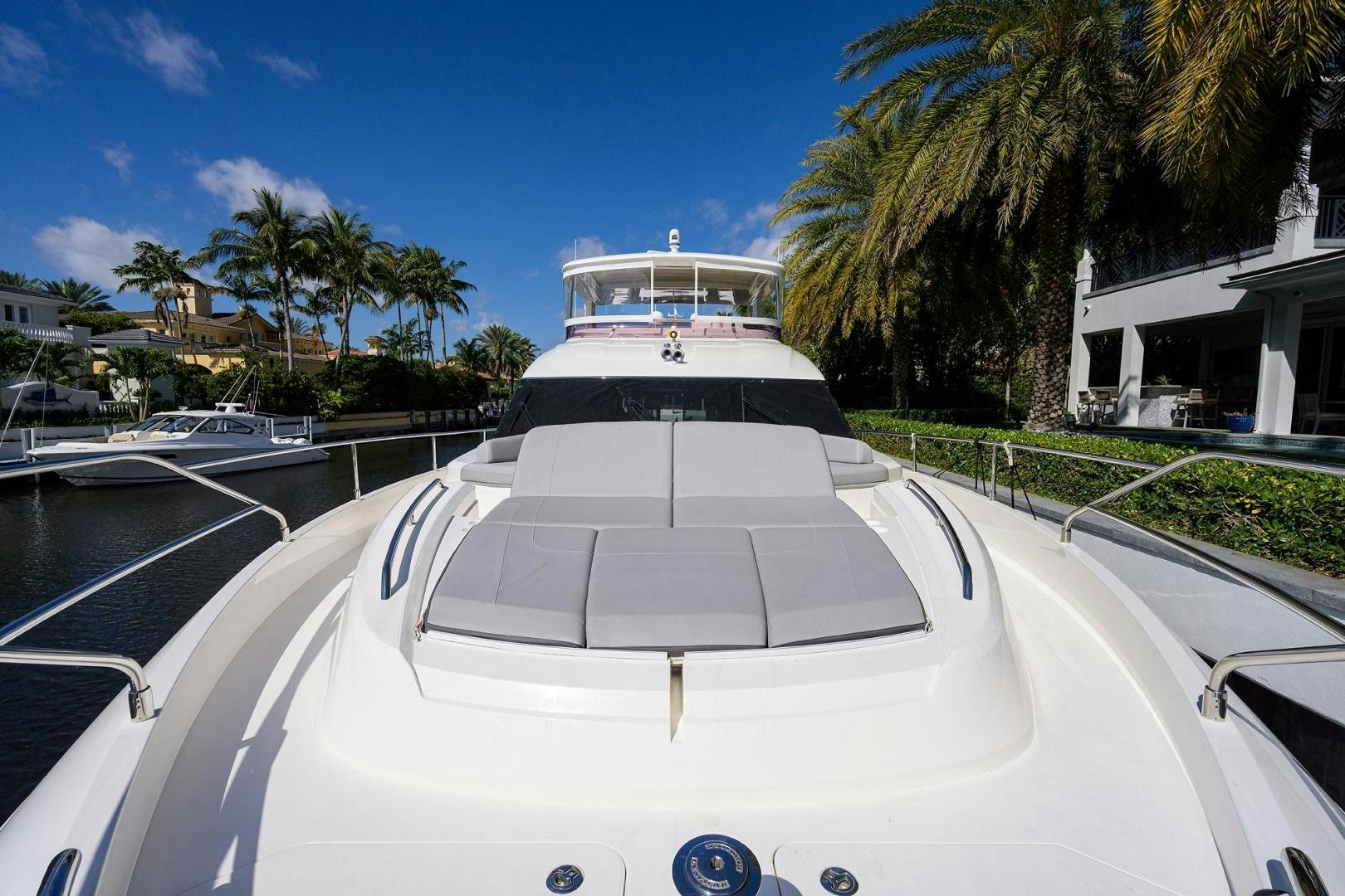 a white car on a road aboard KHATCH YOU LATER Yacht for Sale